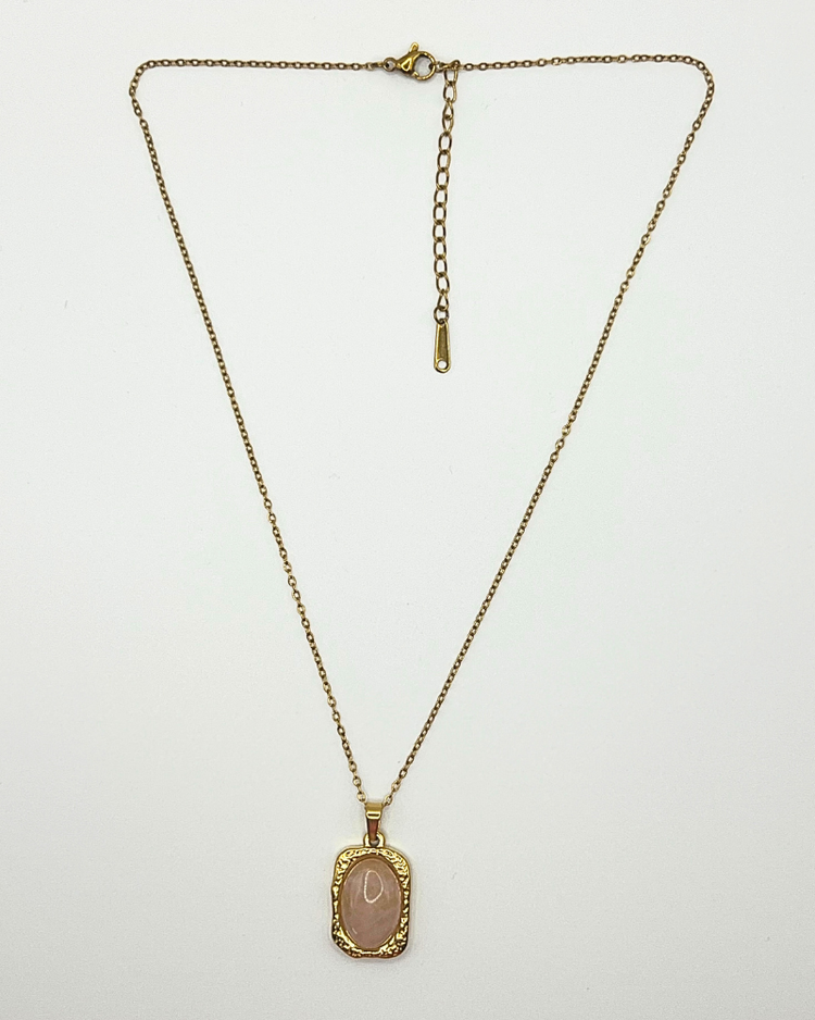 Goudkleurige roestvrijstalen ketting met roze bedel van bergkristal