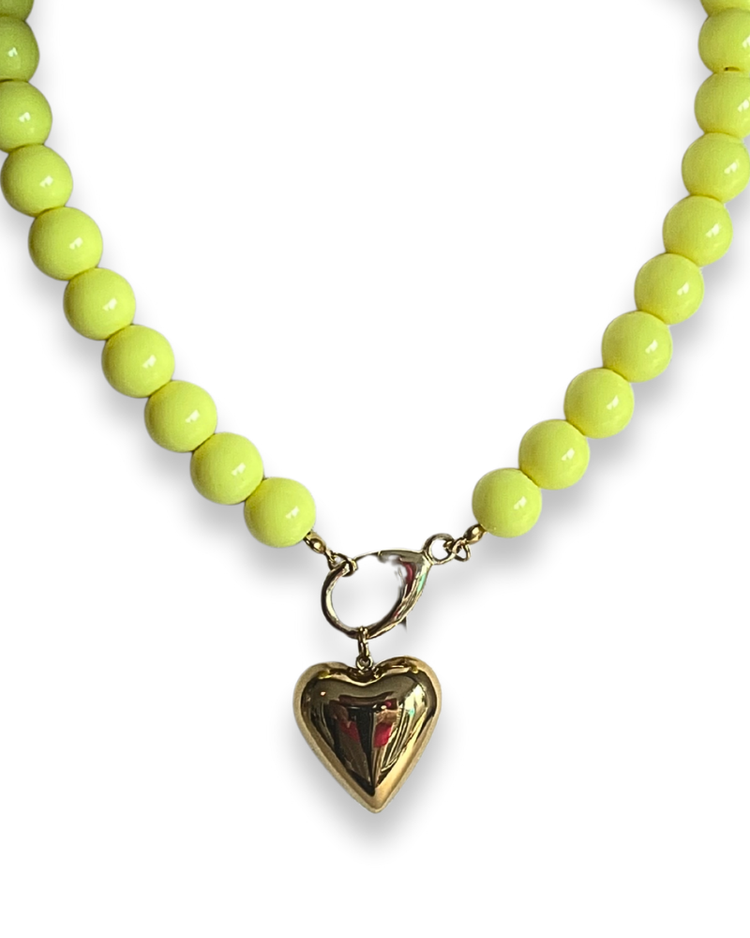 Gele kralenketting met hart