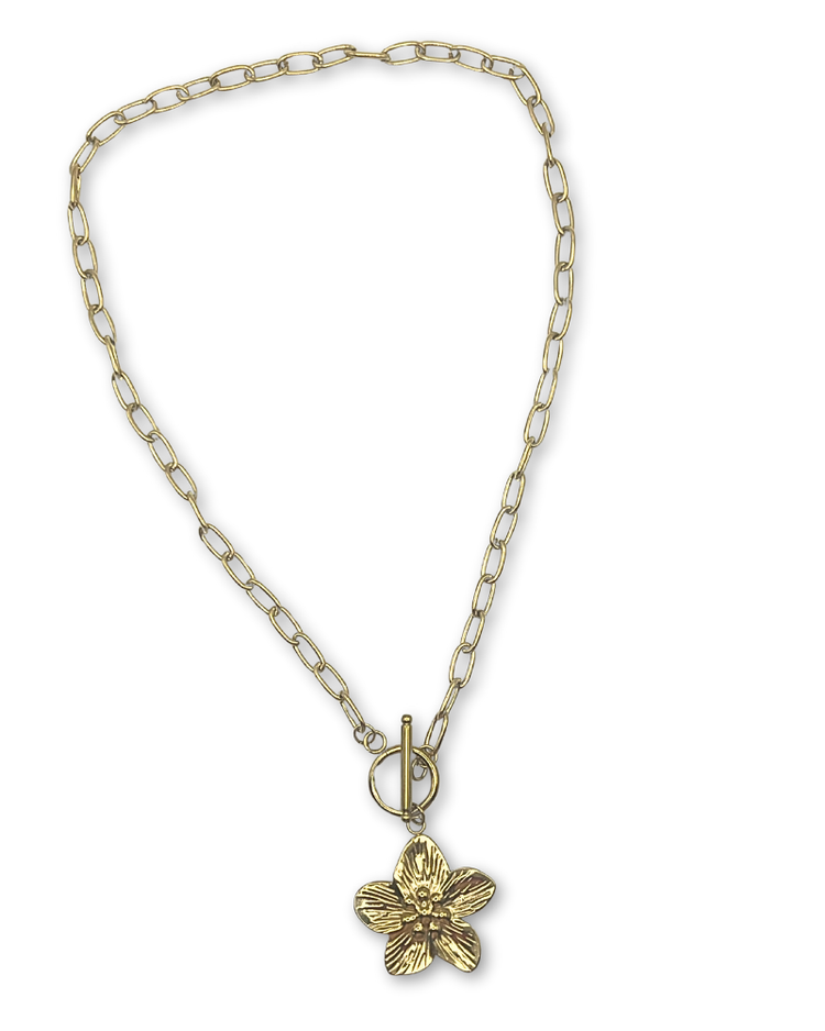 Goudkleurige schakelketting met grote bloem