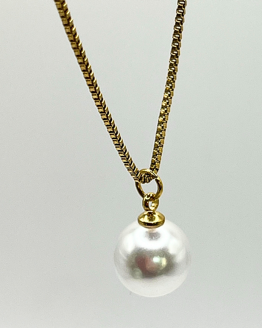 Goudkleurige ketting met imitatieparel