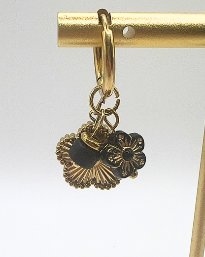 Goud- en zwartkleurige midnight bloom oorbellen