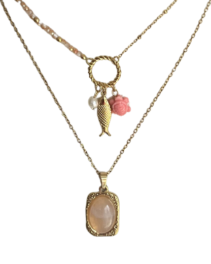 Kettingset met gouden en roze bedels